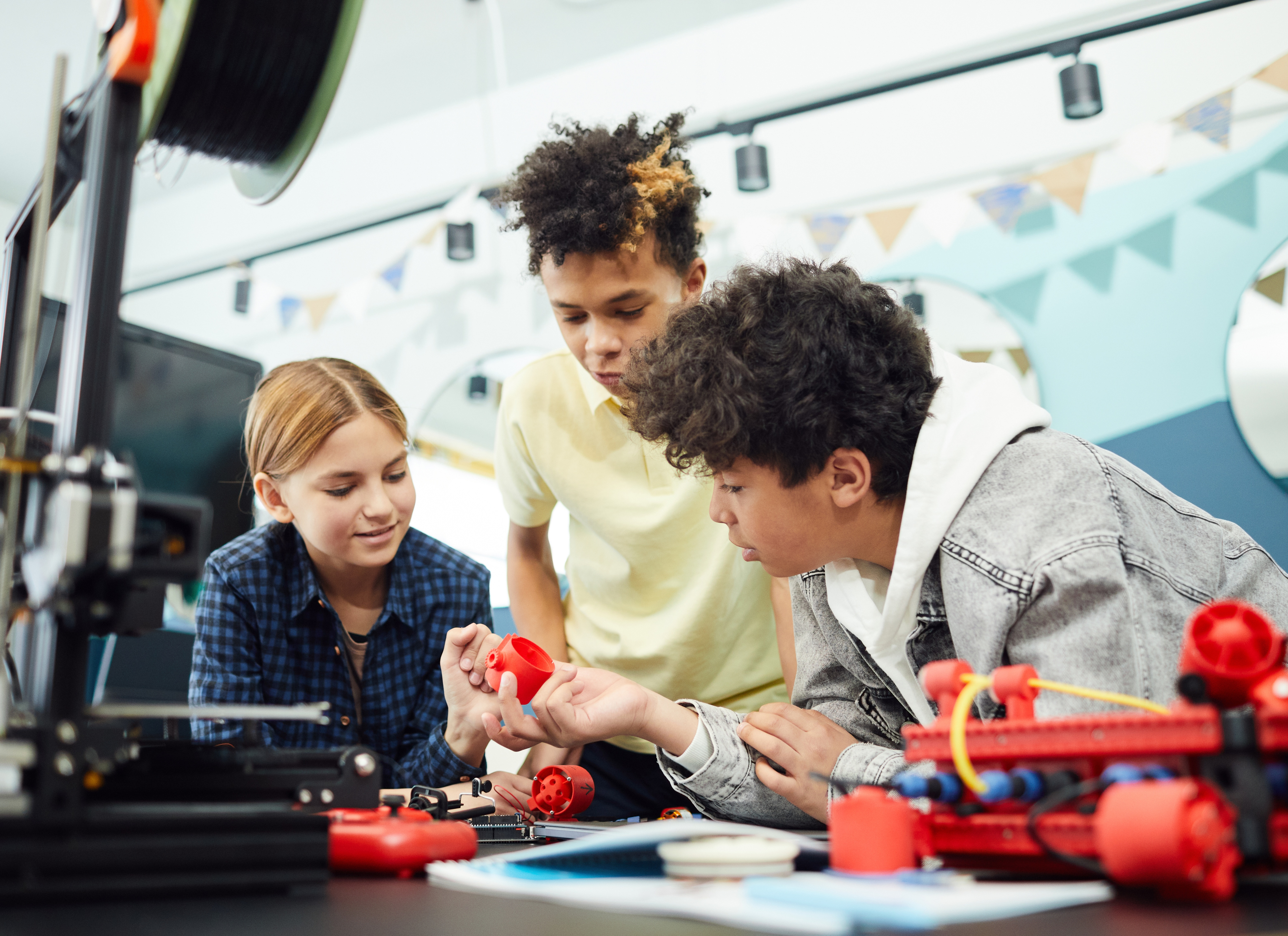 Kids putting together an invention
